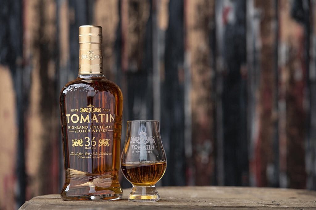 Tomatin 36 YO mood shot glass on wood